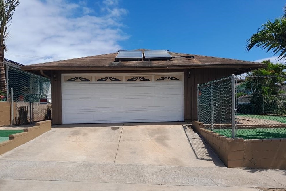 a front view of a house with yard