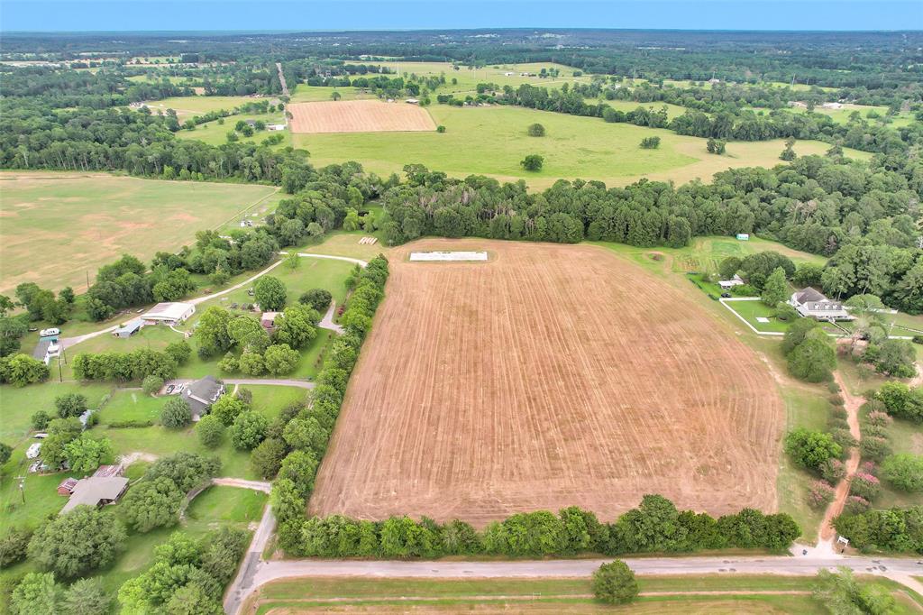 a view of a lake with a big yard