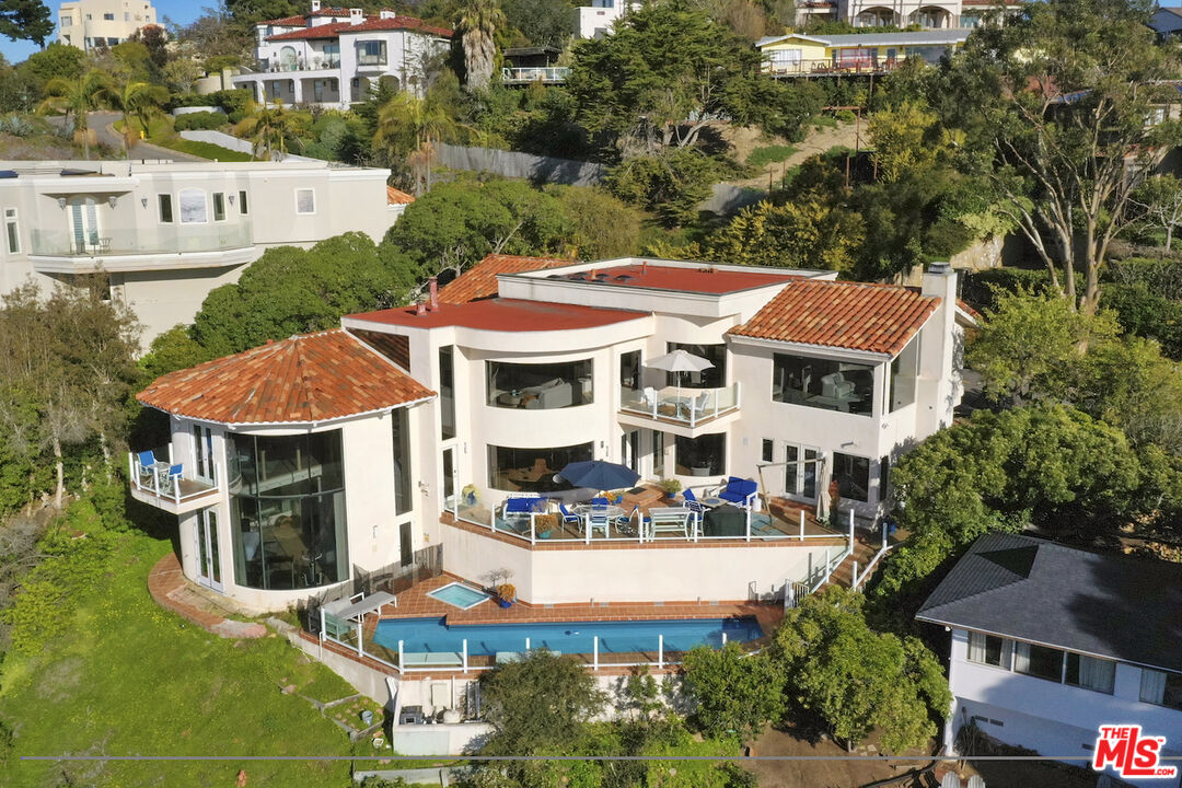 a view of a building with a swimming pool