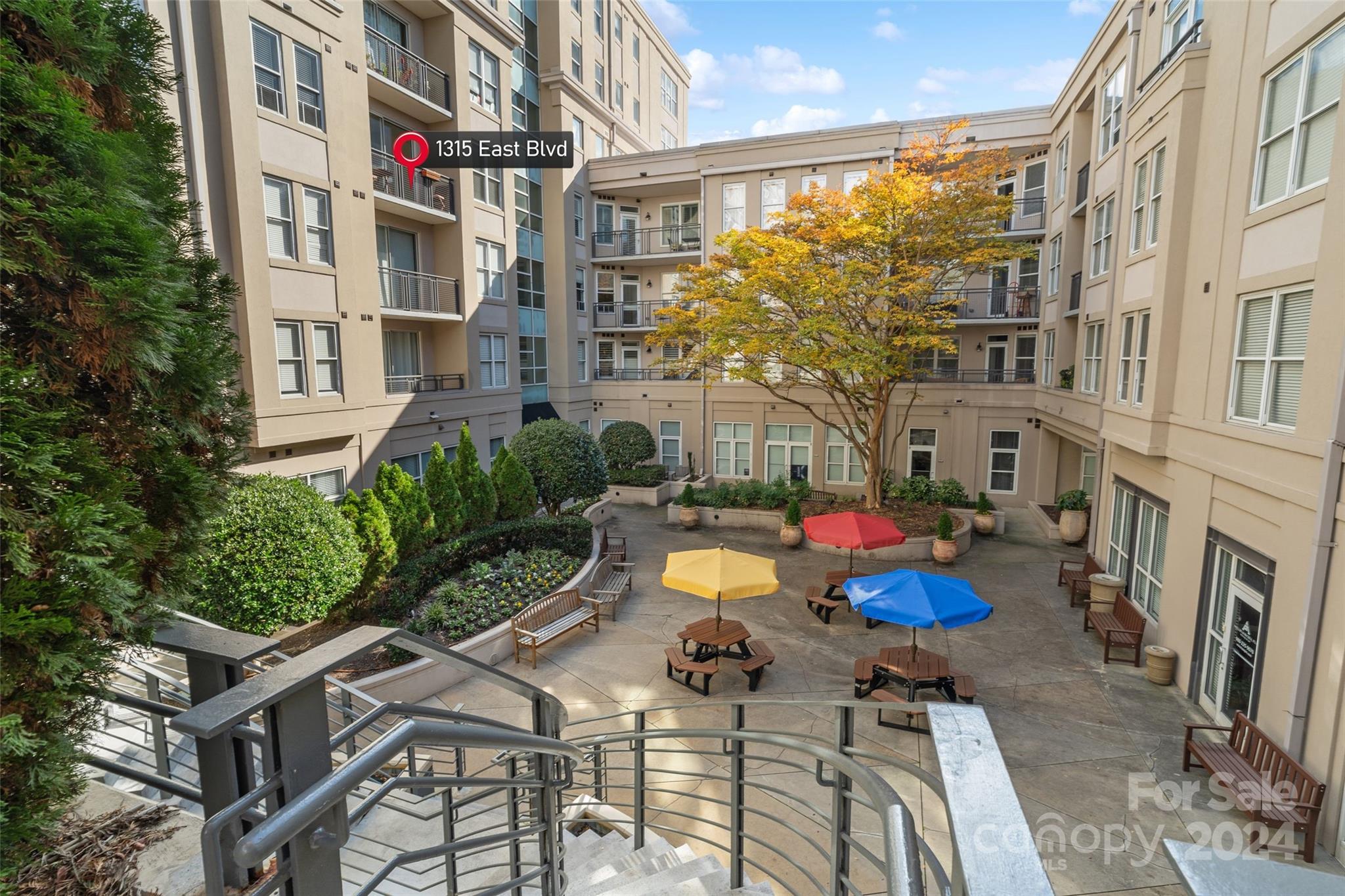 a view of a chairs and tables in the patio