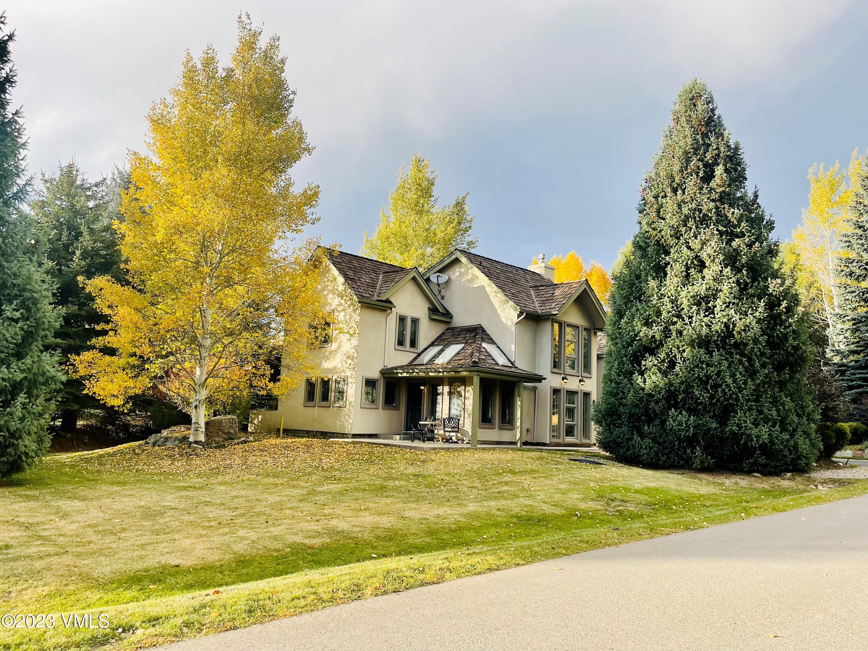 a view of a house with a swimming pool