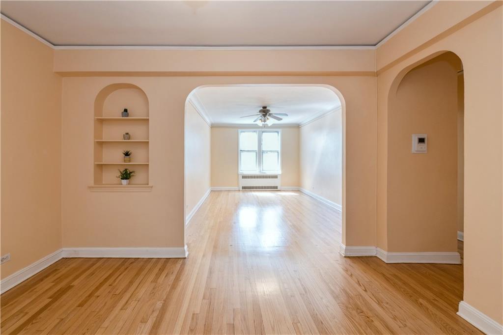 a view of gallery with wooden floor