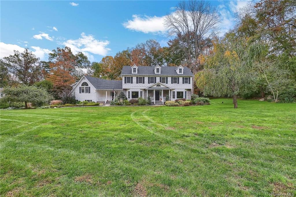 a view of a house with a big yard