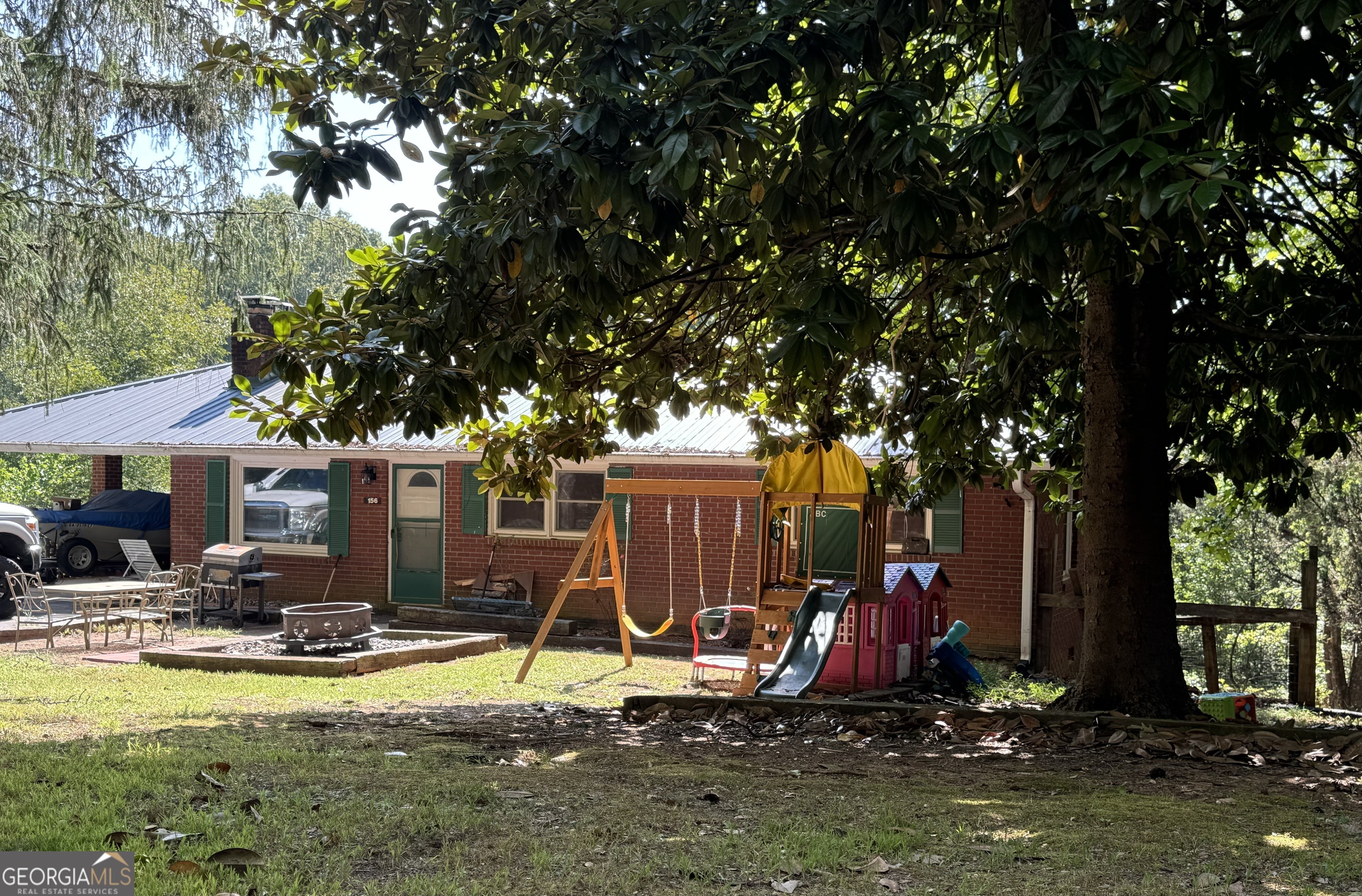 a view of a house with swimming pool