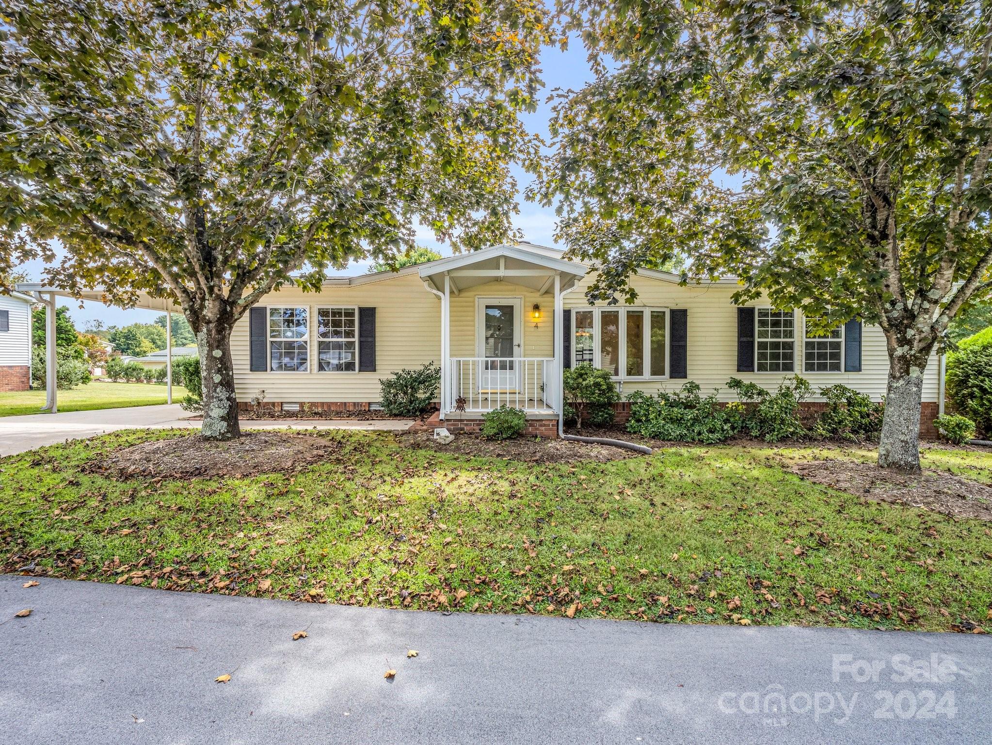 front view of a house with a yard