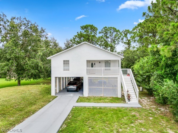 a view of house with backyard and entertaining space