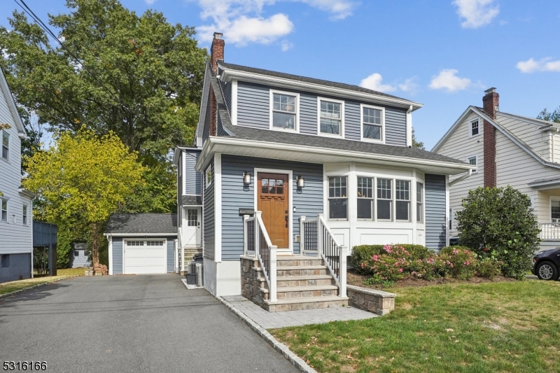 front view of house with a yard