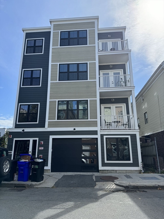 a front view of multi story residential apartment building