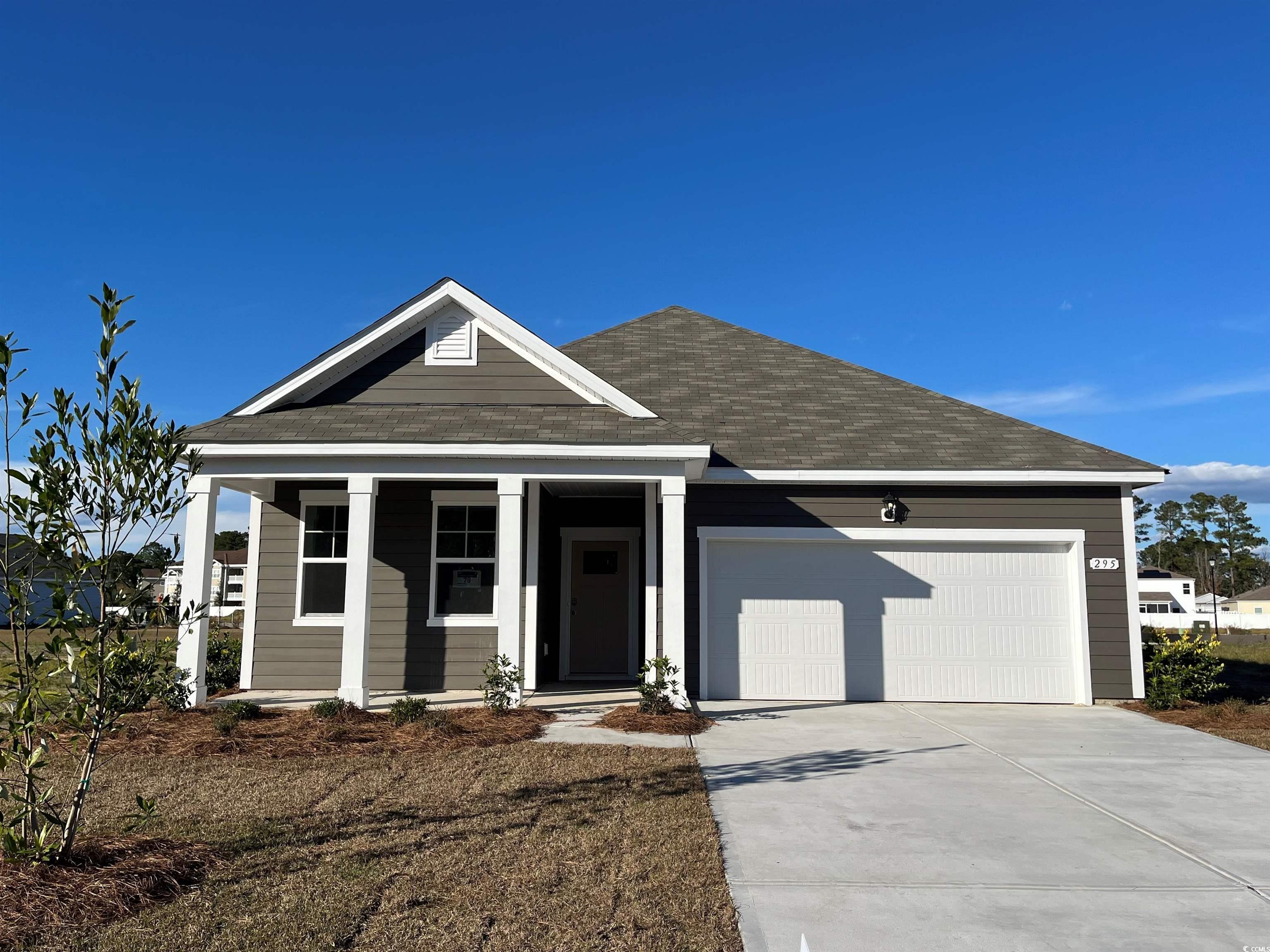 View of front of home with a garage