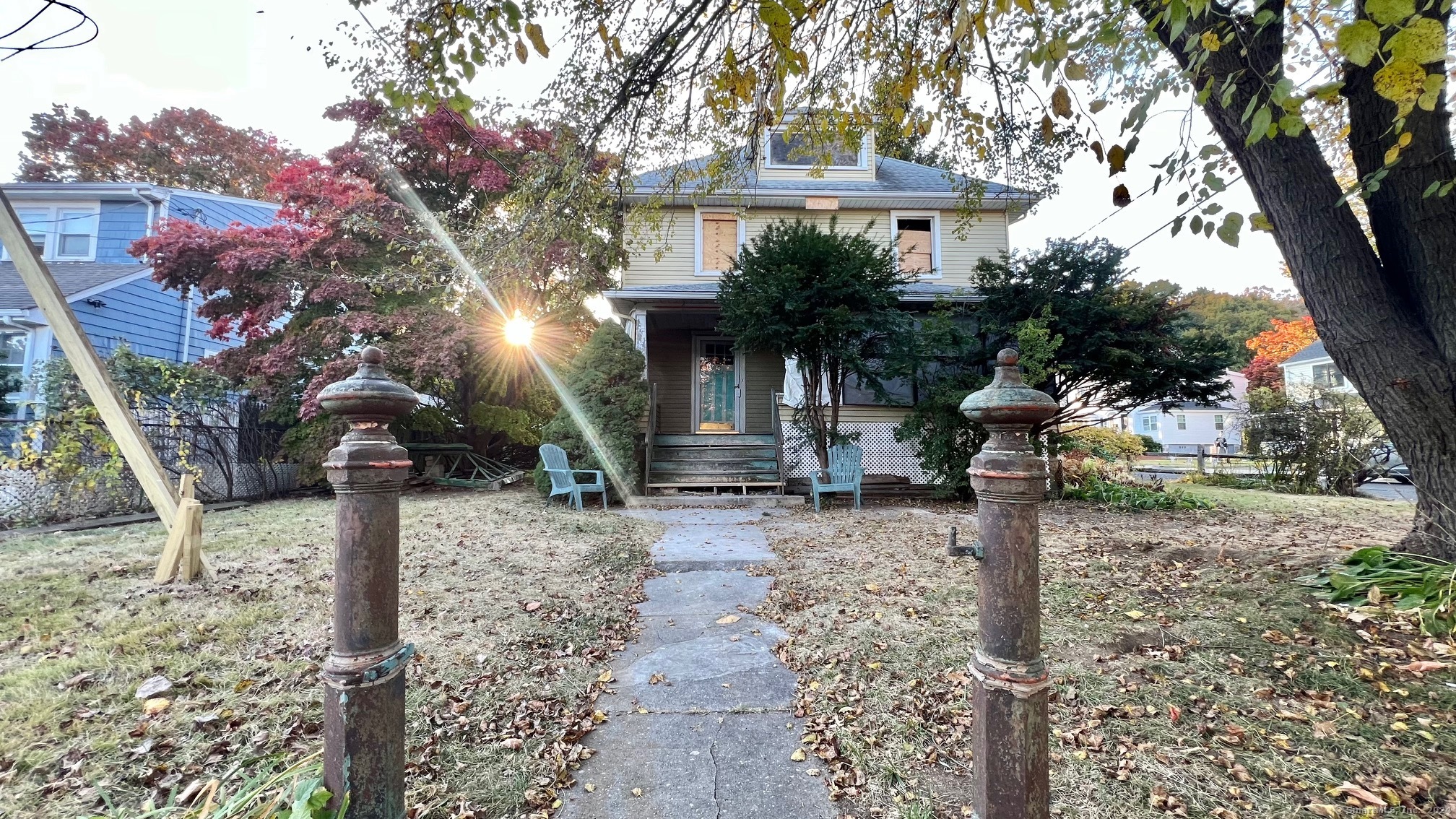 a front view of a house with garden