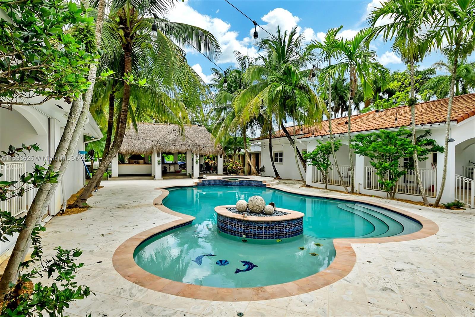 a view of a swimming pool with a yard