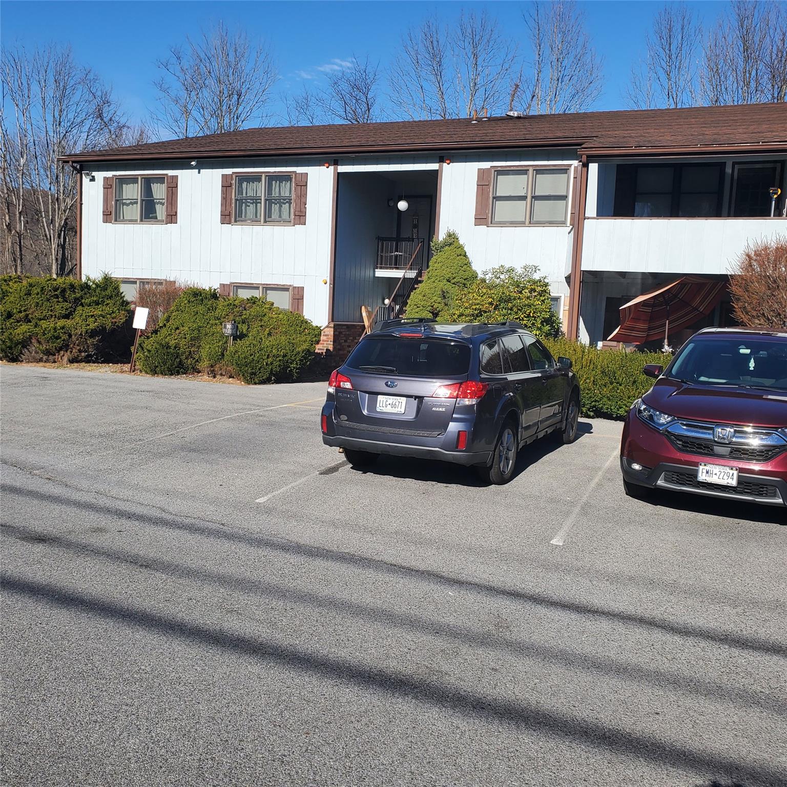 a car parked in front of a house