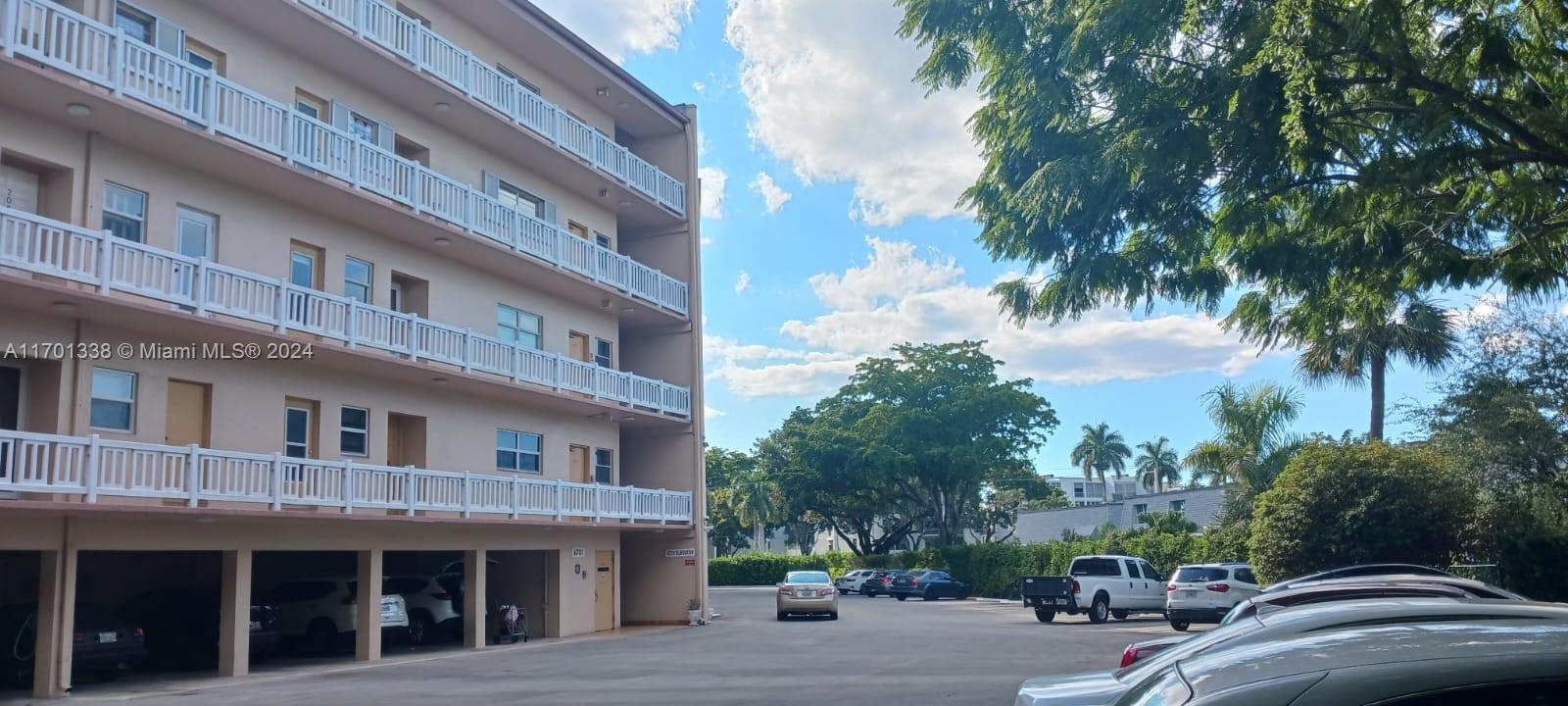 a view of a building with a street