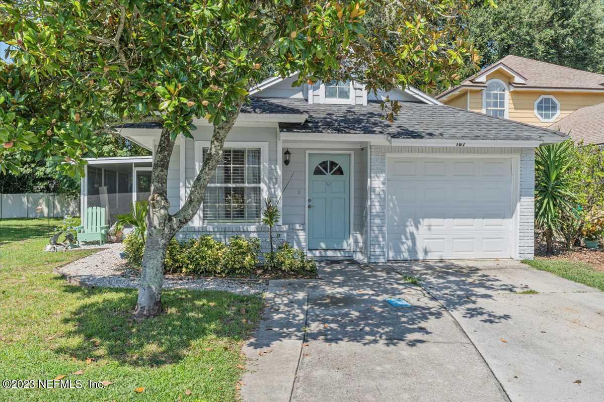 front view of a house with a yard