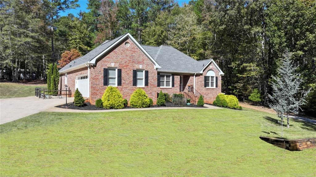 front view of a house with a yard