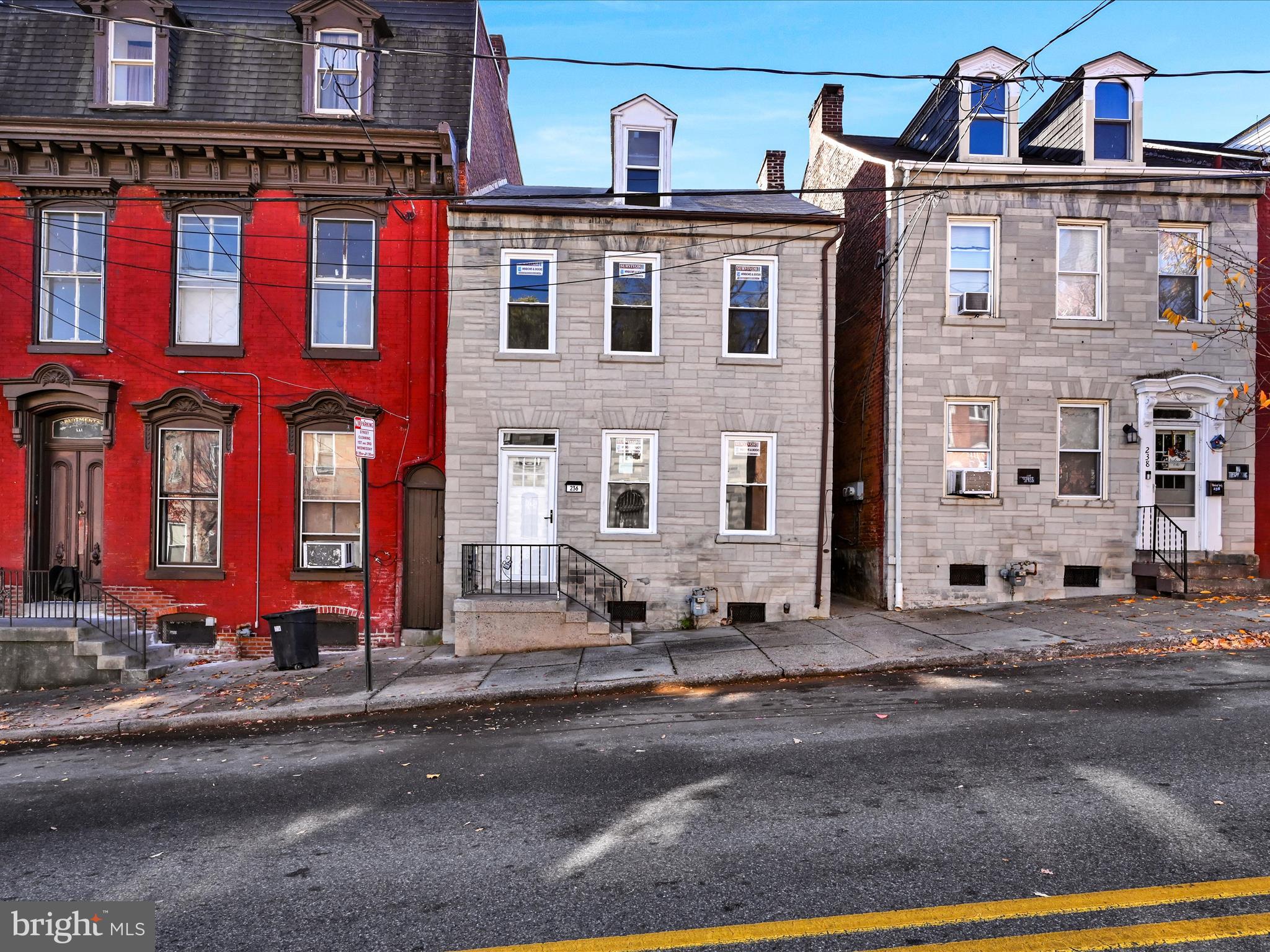 front view of a building with a street