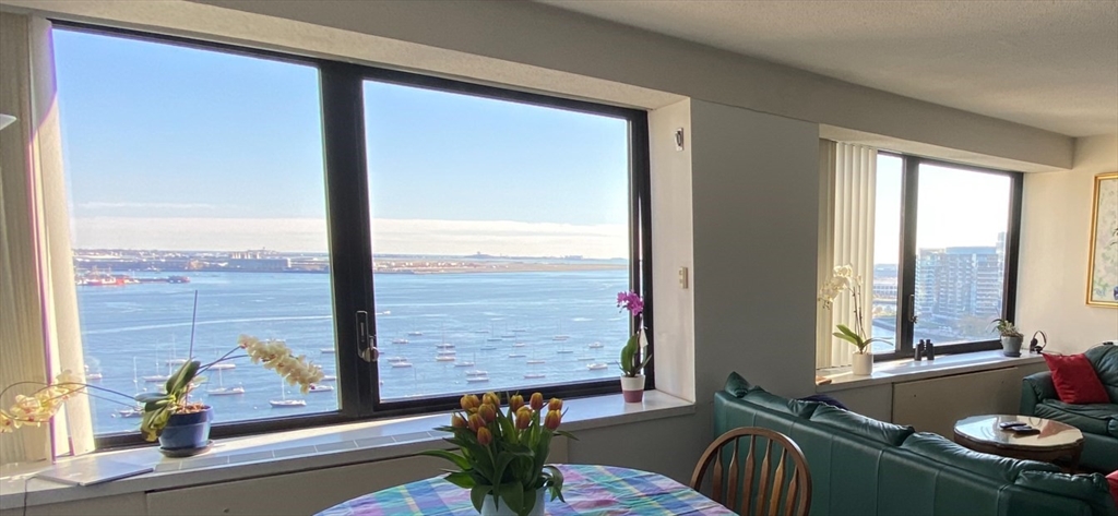 a living room with large window