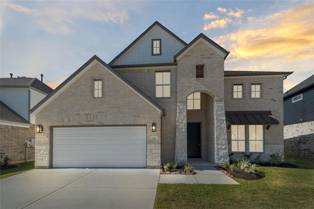 Welcome home to 1912 Golden Spruce Lane located in Barton Creek Ranch and zoned to Conroe ISD.