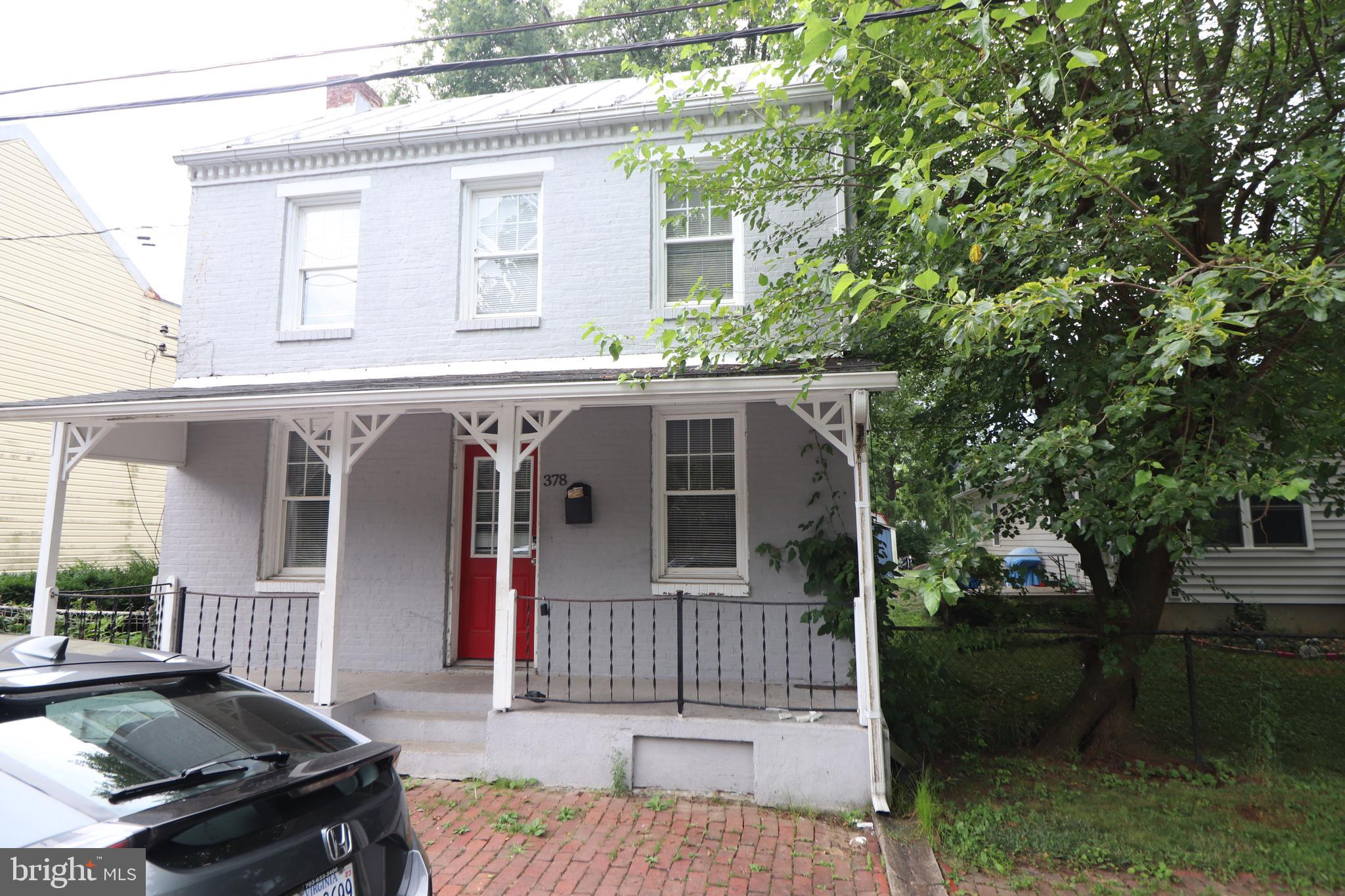 a view of a house with a porch