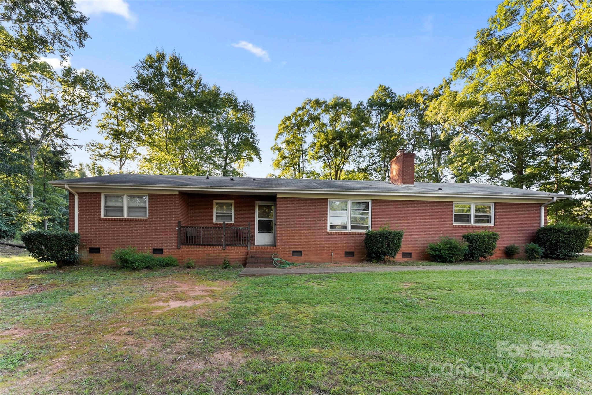 front view of a house with yard