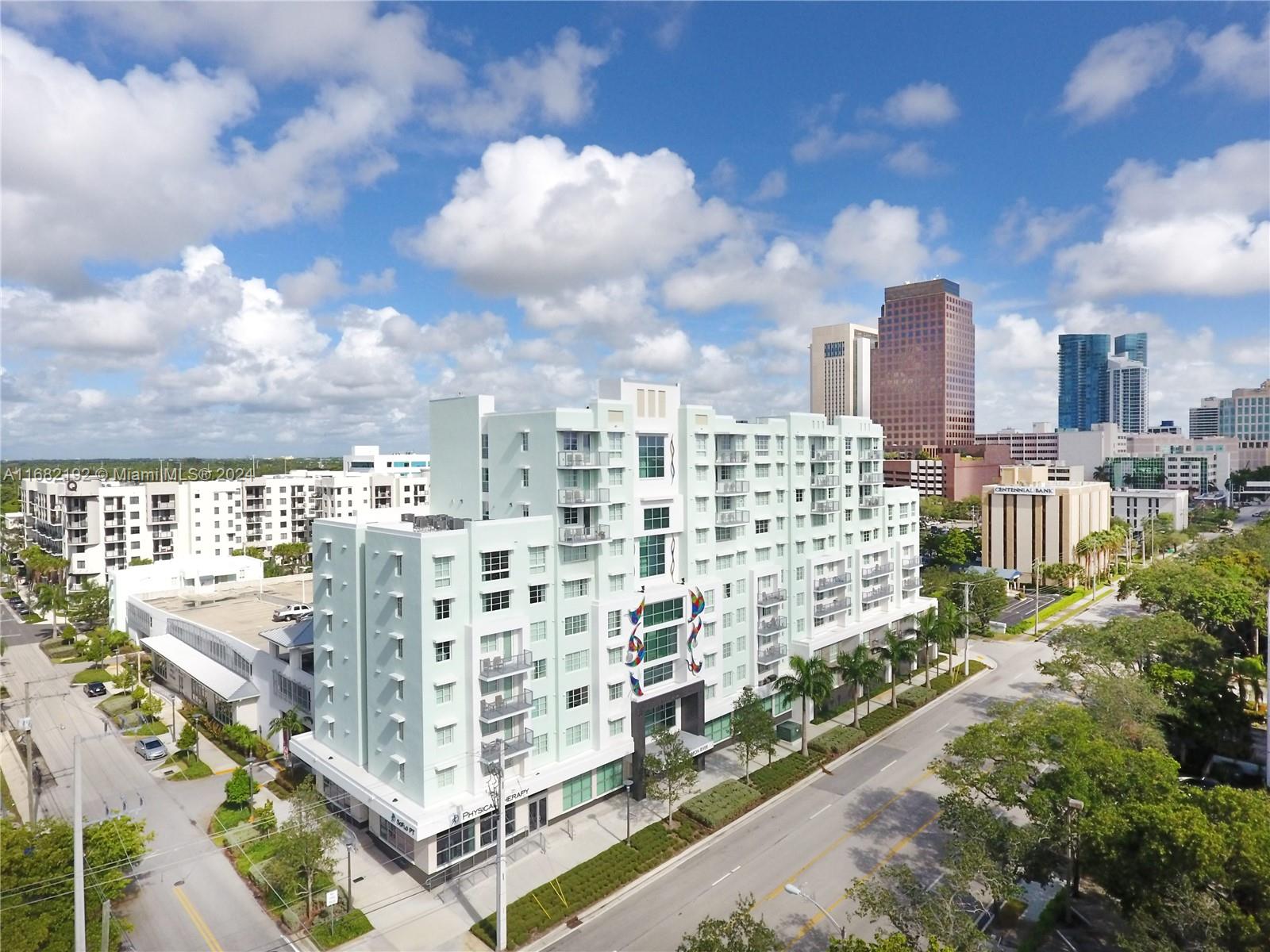 a view of a city with tall buildings