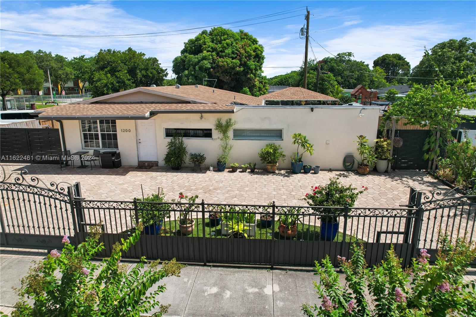 a front view of a house having yard