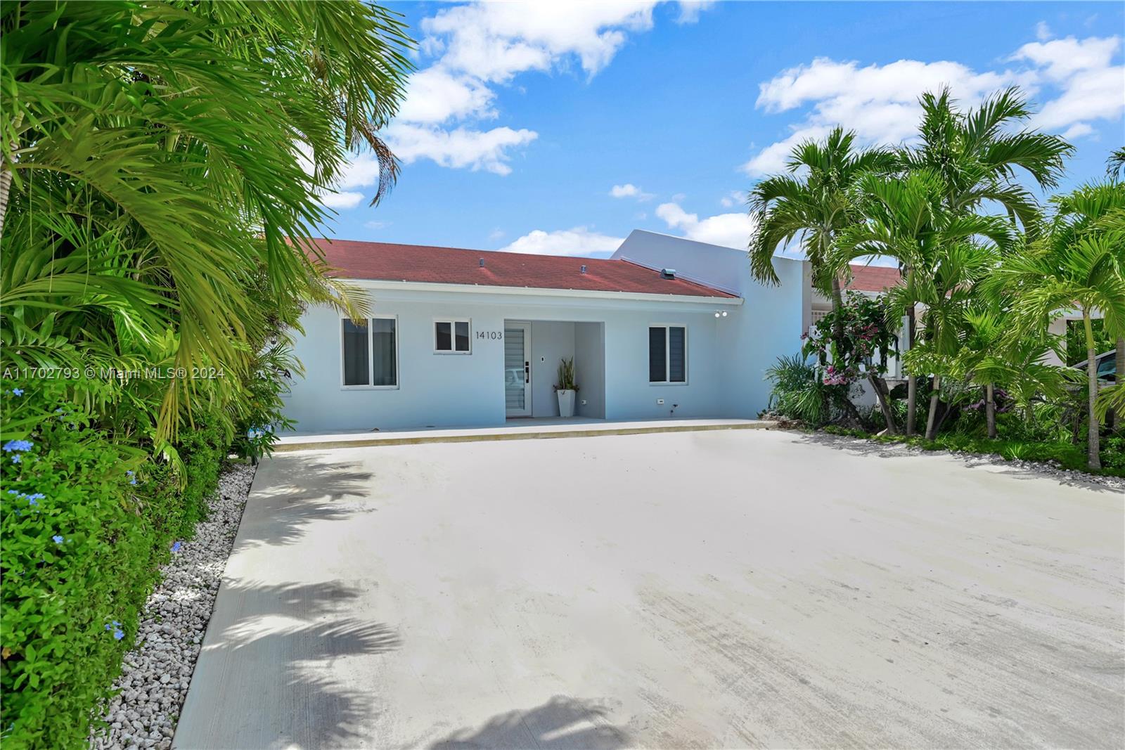 a view of house with swimming pool outdoor seating