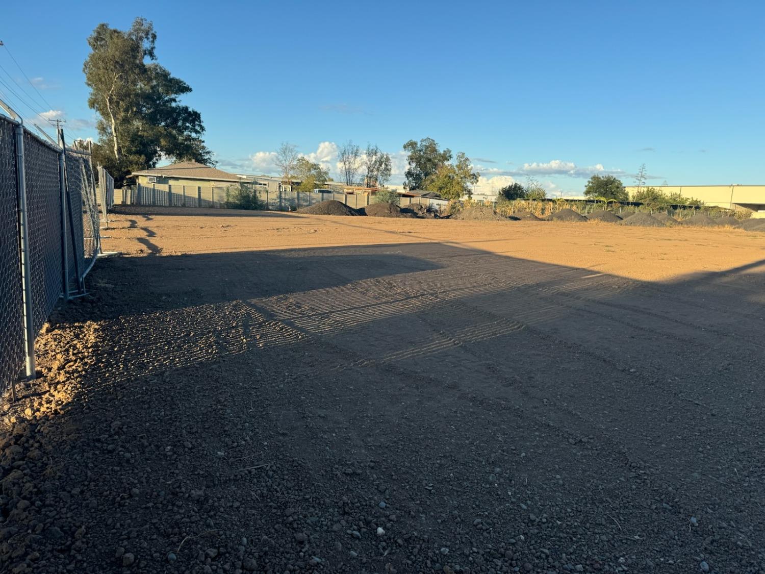 a view of a city street from a yard