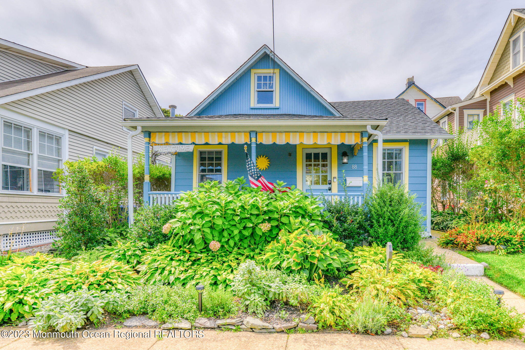 front view of a house with a yard