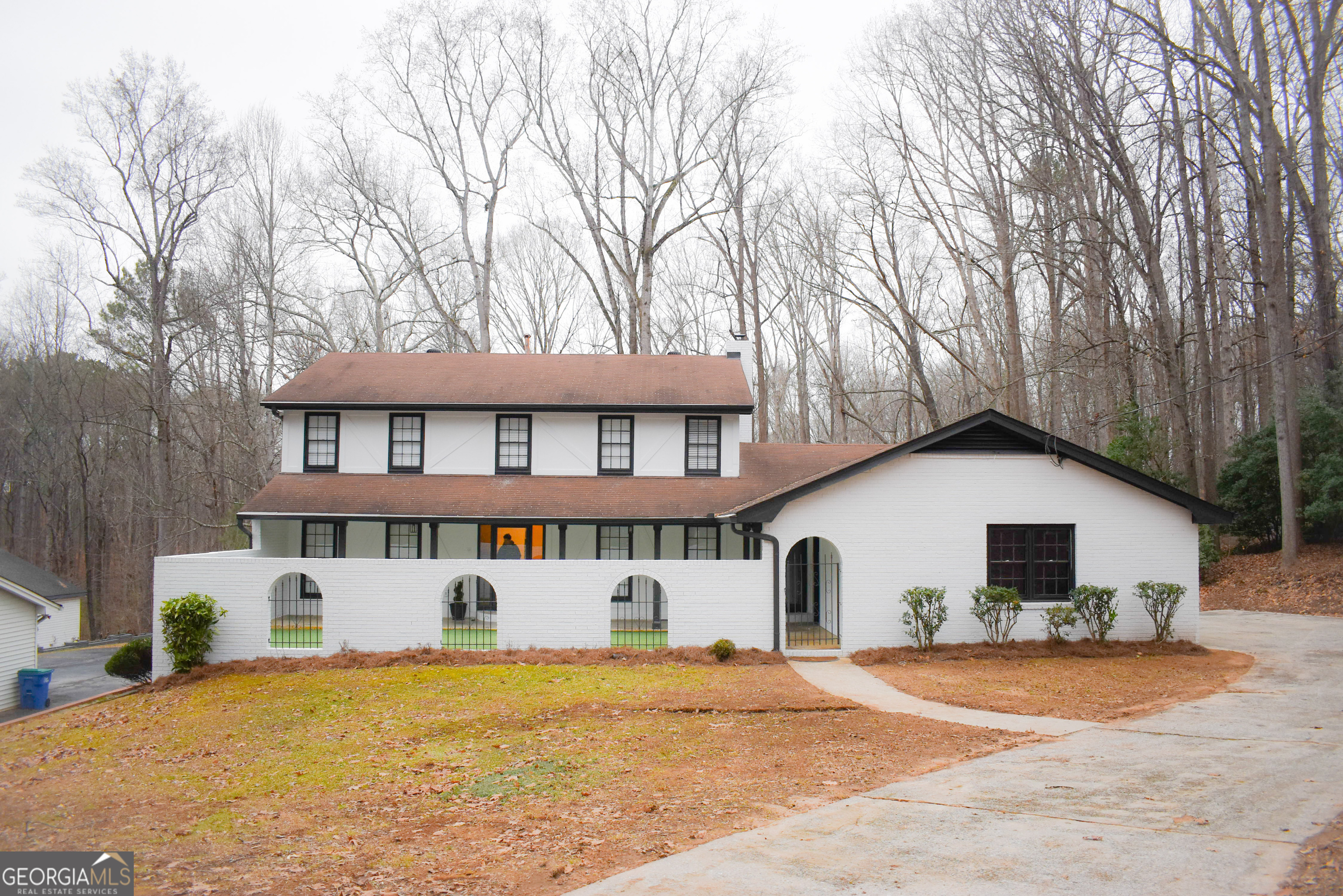 front view of a house with a yard