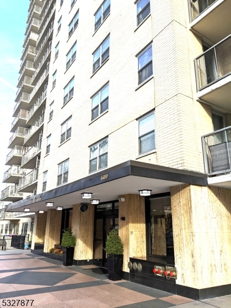 a view of a building with a street