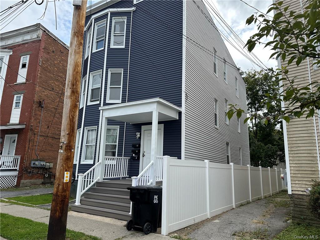 View of front of house featuring covered porch