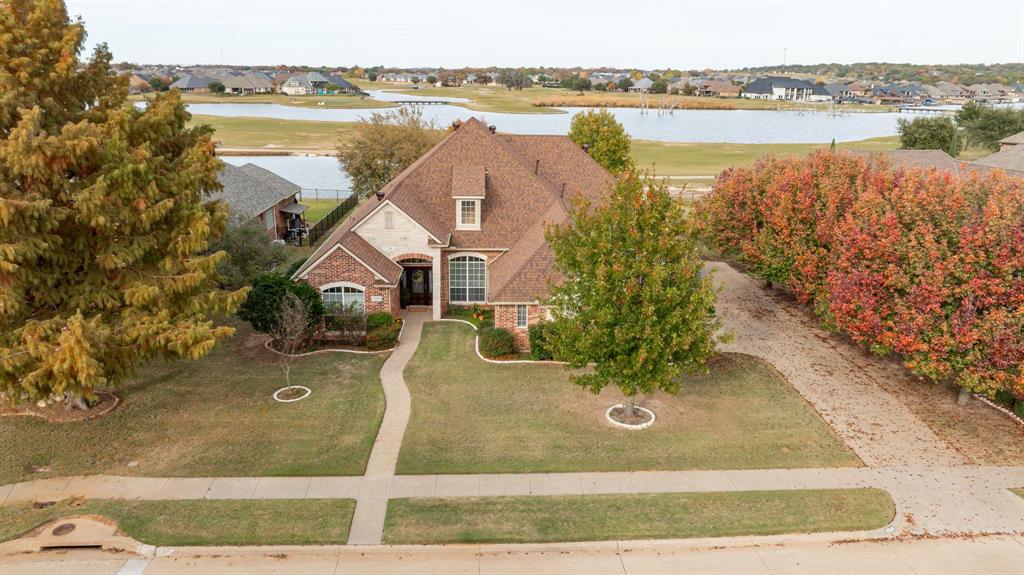 a view of a lake with a yard