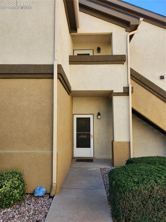 a front view of a house with a garage