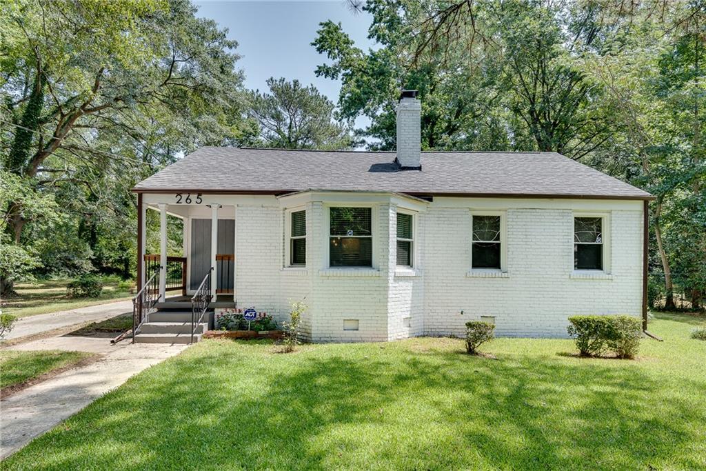 a house view with a garden space