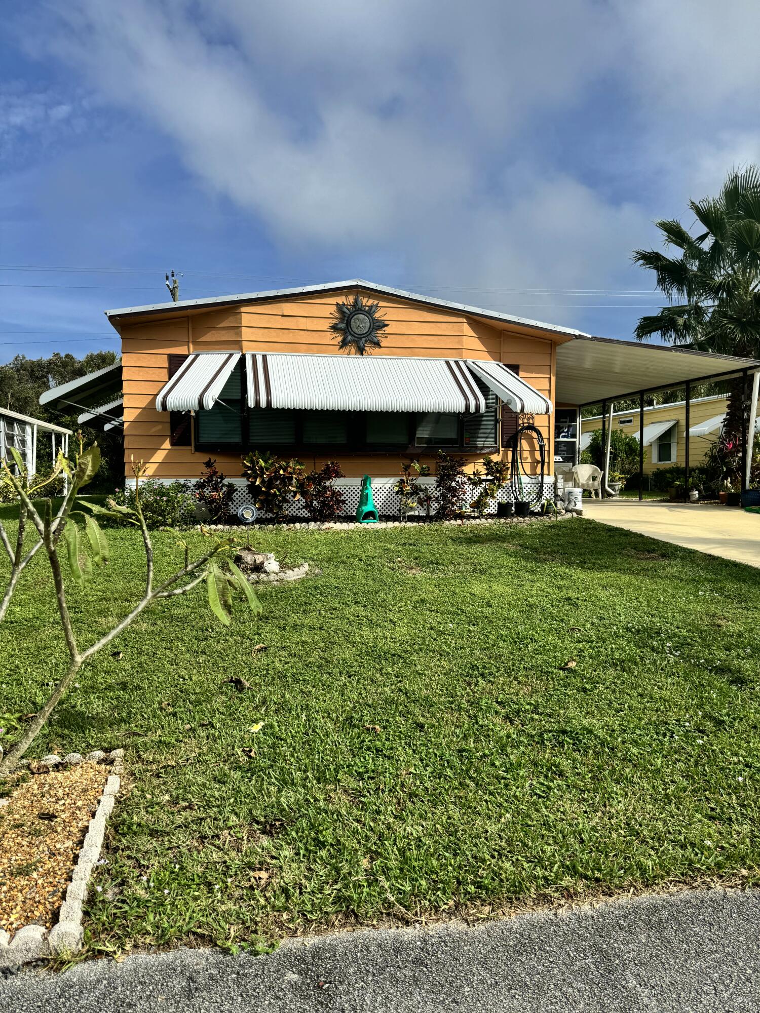 a view of yard with swimming pool and outdoor seating