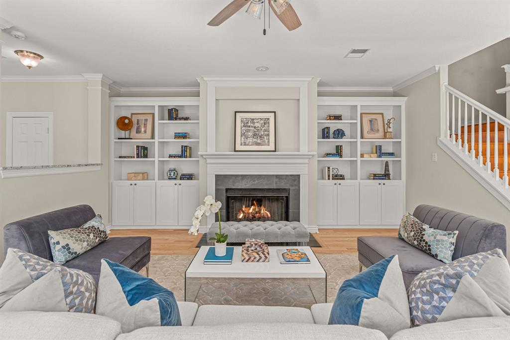 a living room with furniture or couch and a fireplace