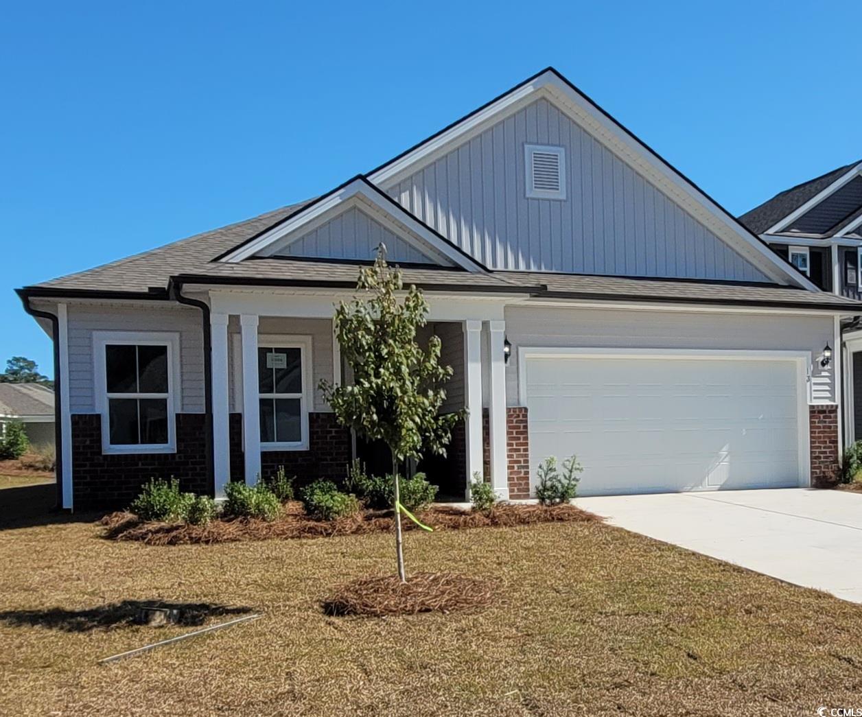 View of front of house featuring a front lawn