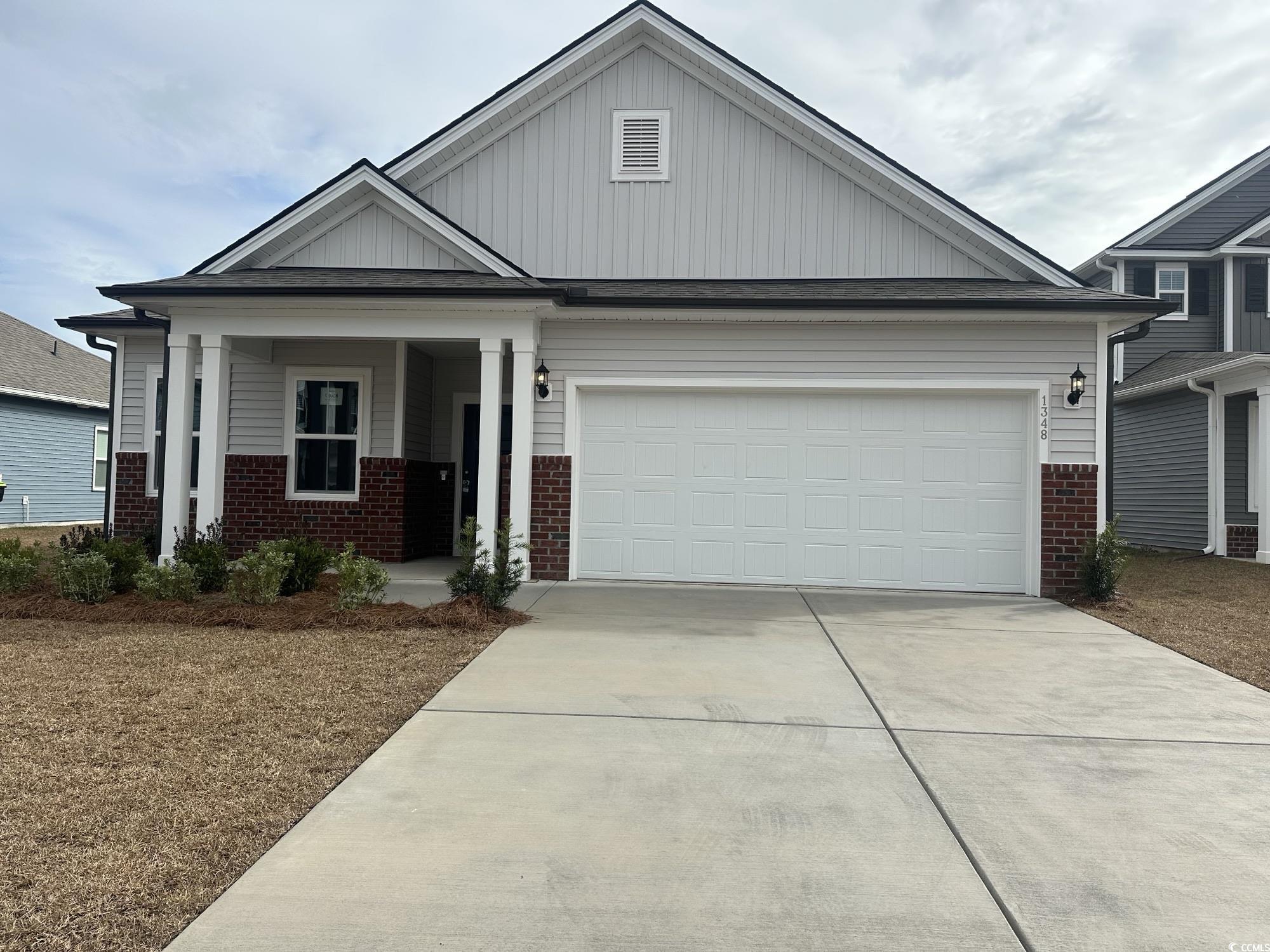 View of front of property with a garage