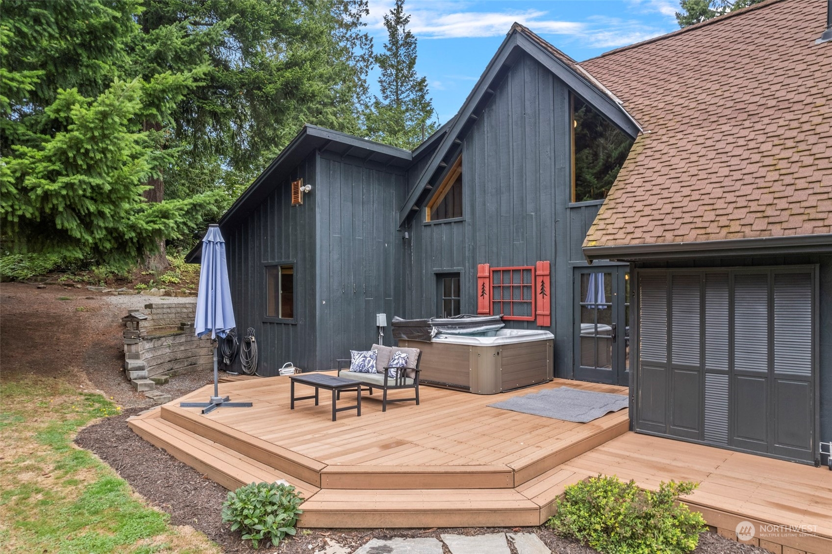 a backyard of a house with seating space