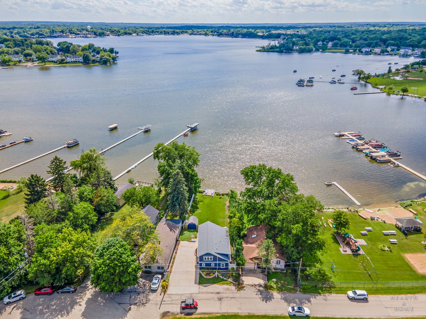 an aerial view of a house with a lake view