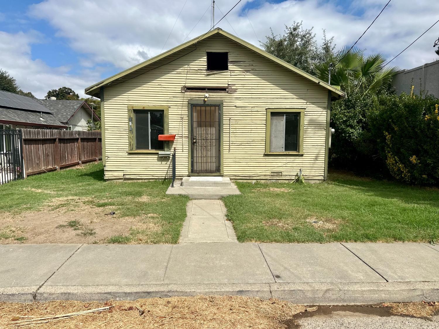 a front view of house with yard