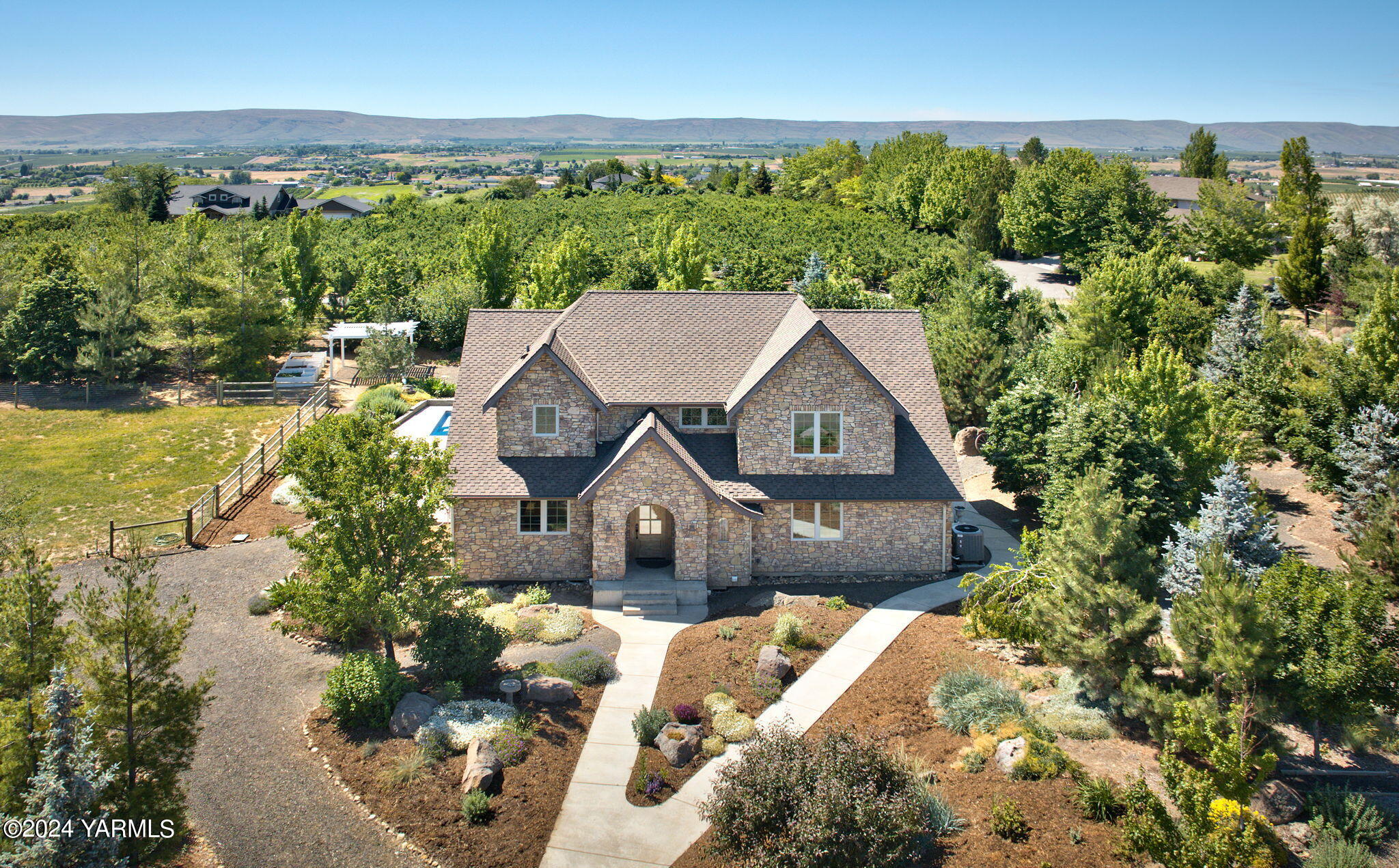 Stone Exterior & Beautiful Landscaping