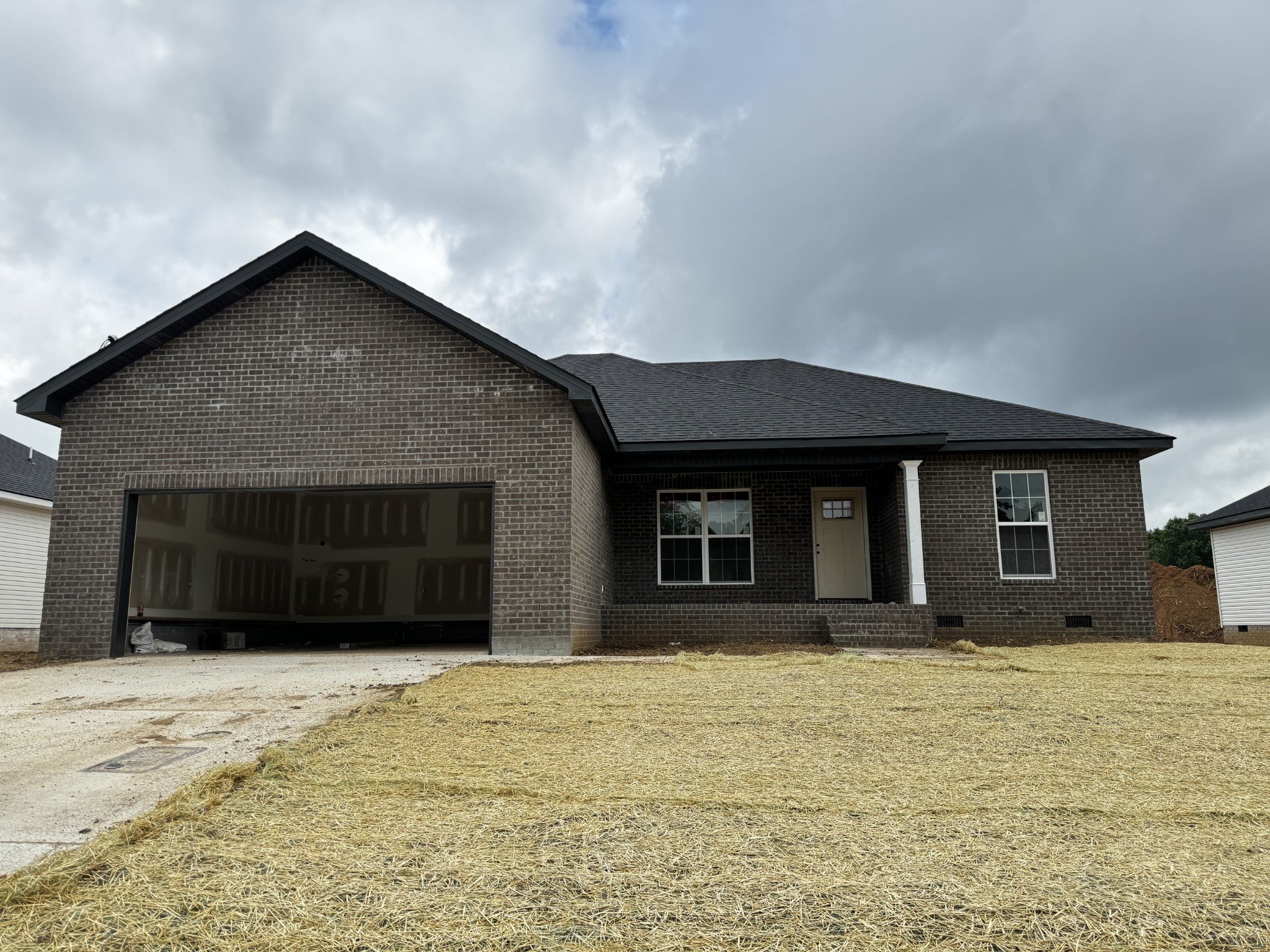 a house with yard in front of it