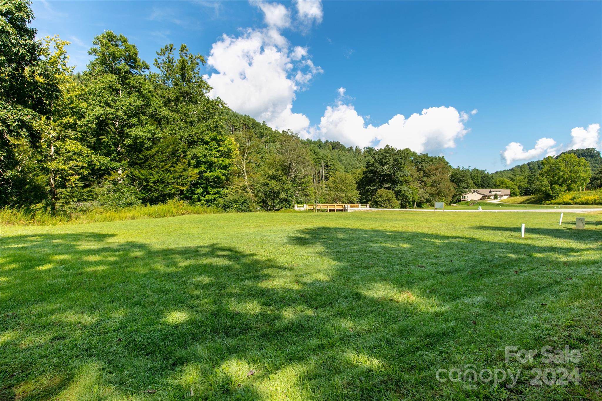 a view of a golf course with a lake