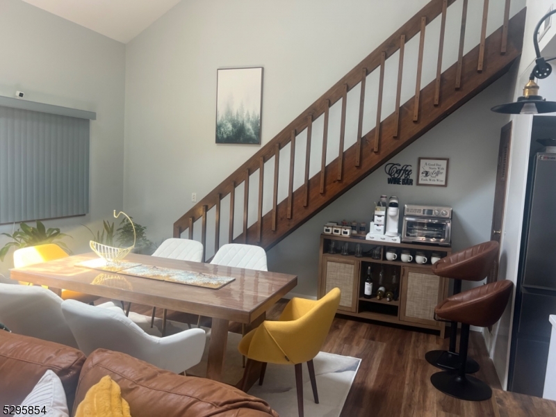 a living room with furniture with wooden floor