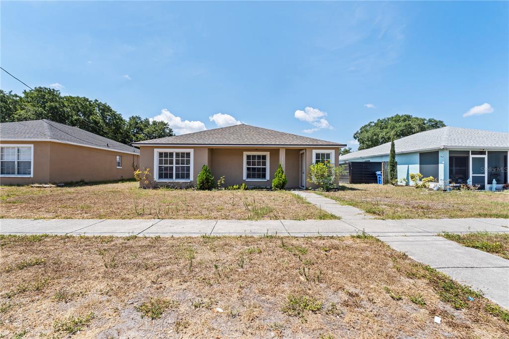 front view of house with a yard