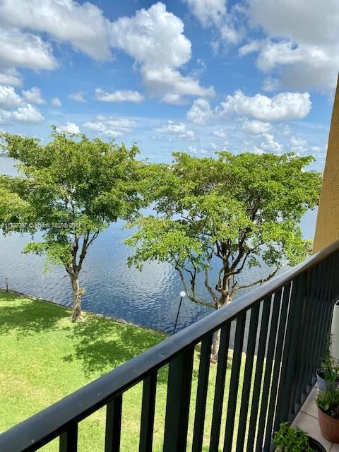 a view of a garden from a balcony