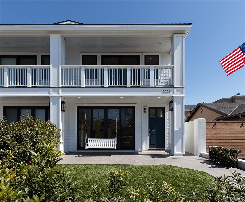 a view front of a house with a yard