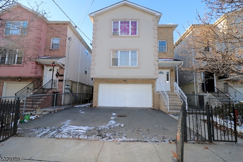 a view of front door and small yard